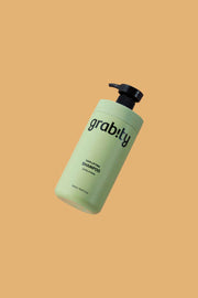 ProtoClinical k-beauty olive green beauty product silhouette on a light background.