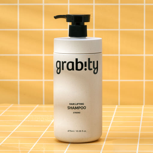 ProtoClinical k-beauty pale gray beauty product silhouette with soft blue lower accents on a white background.