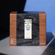 ProtoClinical k-beauty [Jung Kwan Jang] CheonNok Energetic 70ml*30Pouch dark product packaging with soft black, tan, and blue tones on a light background