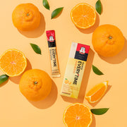ProtoClinical k-beauty golden amber beauty graphic with soft vertical forms on a light background.
