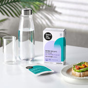 ProtoClinical k-beauty cool gray beauty product silhouette with a pale blue accent on a light background.