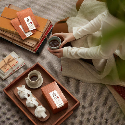 ProtoClinical k-beauty [Jung Kwan Jang] Korean Red Ginseng Extract Jangsu: Yul Jangsu Essence 50ml*30ea packaging in warm brown tones with pale blue accents on a light background