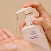 ProtoClinical k-beauty soft peach beauty detail with warm coral tones on a light background.