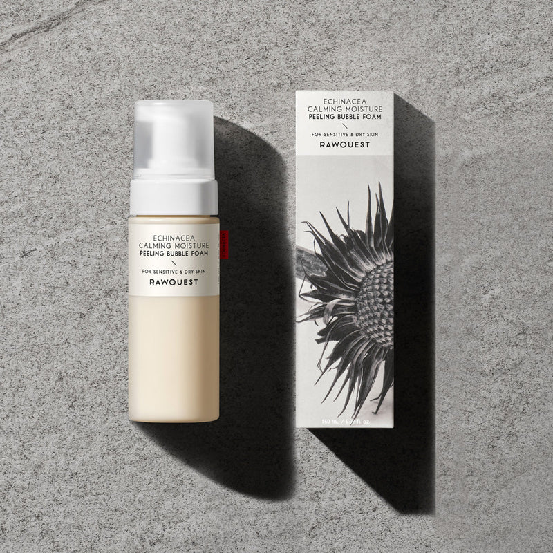 ProtoClinical k-beauty soft gray beauty detail with pale vertical bands on a dark background.