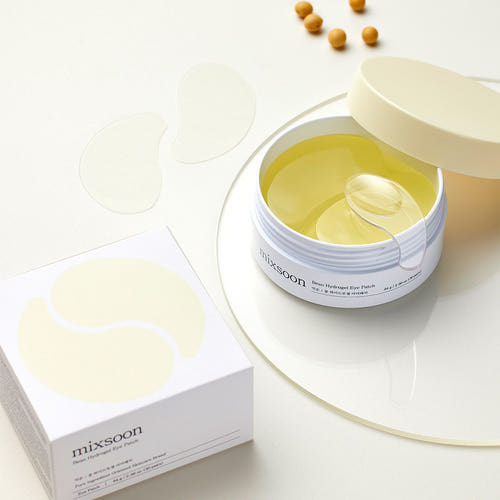 ProtoClinical k-beauty mixsoon Bean Hydrogel Eye Patch 84g (30 pairs) single warm gold and brown eye patch package shown upright on a pale yellow background