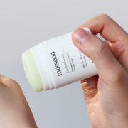 ProtoClinical k-beauty beige beauty bottle silhouette with soft blue upper accents on a light background.