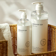 ProtoClinical k-beauty blue and beige product packaging with a dark brown lower section on a light background.