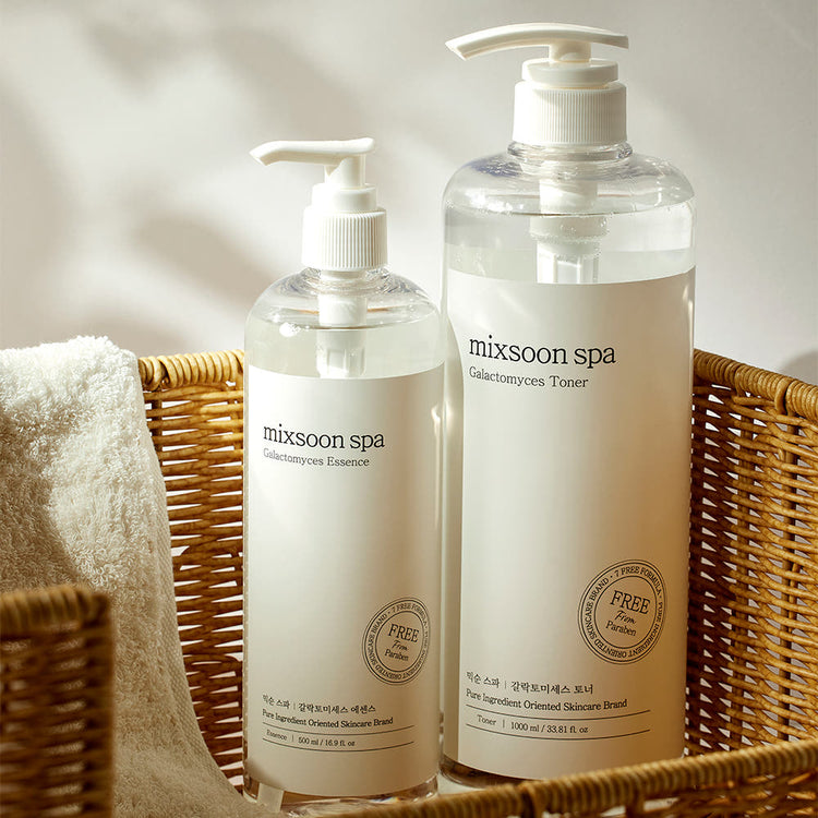 ProtoClinical k-beauty blue and beige product packaging with a dark brown lower section on a light background.