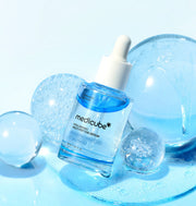 ProtoClinical k-beauty MEDICUBE: Hyaluronic Multi Peptide Serum (30ml) single upright pale blue serum bottle centered on a soft blue background