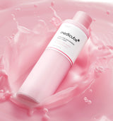 ProtoClinical k-beauty MEDICUBE: PDRN Pink Niacinamide Milky Toner (150ml) single upright pale pink toner bottle centered on a light background