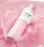 ProtoClinical k-beauty MEDICUBE: PDRN Pink Niacinamide Milky Toner (150ml) single upright pale pink toner bottle centered on a light background