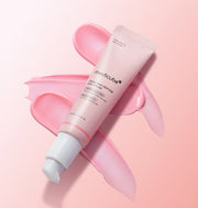 ProtoClinical k-beauty soft peach beauty graphic with a muted mauve center on a light background.
