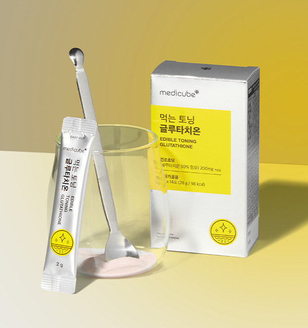 ProtoClinical k-beauty MEDICUBE: Edible Toning Glutathione 2g X 14ea (28g) single upright yellow supplement package centered on a pale background