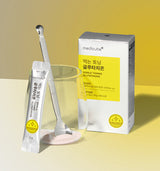 ProtoClinical k-beauty MEDICUBE: Edible Toning Glutathione 2g X 14ea (28g) single upright yellow supplement package centered on a pale background