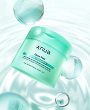ProtoClinical k-beauty Anua PDRN 100 Hyaluronic Acid Glow Pad 60P/180ml single teal green vertical product silhouette centered on a pale aqua background with soft blue lower shading