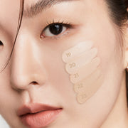 ProtoClinical k-beauty cool blue cosmetic product packaging with a darker center on a light background.