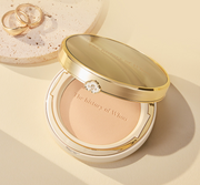 ProtoClinical k-beauty warm tan beauty product silhouette on a soft peach and cream background.