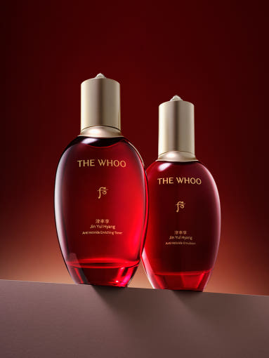 ProtoClinical k-beauty dark burgundy cosmetic product on a black background.