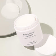 ProtoClinical k-beauty nooni Daily Turnover Peel Pad 145ml square product detail graphic with a plain warm beige field and soft neutral background