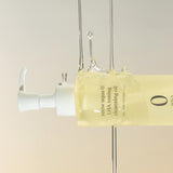ProtoClinical k-beauty nooni Snow Aqua 0 LHA Toning Cleansing Oil 200ml square product graphic with a single cleansing oil package on a white background