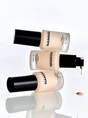 ProtoClinical k-beauty NAMING Layered Cover Foundation 15ml single upright beige foundation package with a darker cap on a white background