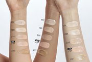ProtoClinical k-beauty warm beige and peach beauty graphic with vertical panel shapes on a white background.
