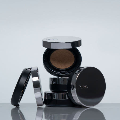 ProtoClinical k-beauty dark charcoal beauty product silhouette on a pale blue-gray background.