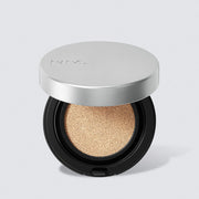 ProtoClinical k-beauty tall warm beige beauty product silhouette with pale blue side accents on a light background.