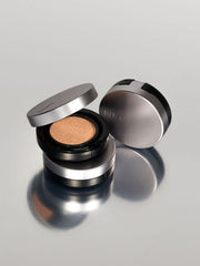 ProtoClinical k-beauty taupe beauty product silhouette centered on a warm beige background.