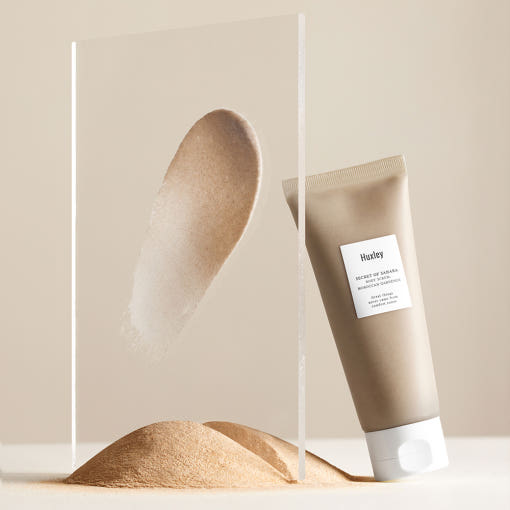 ProtoClinical k-beauty beige beauty product silhouette with soft gray side shading on a light background.