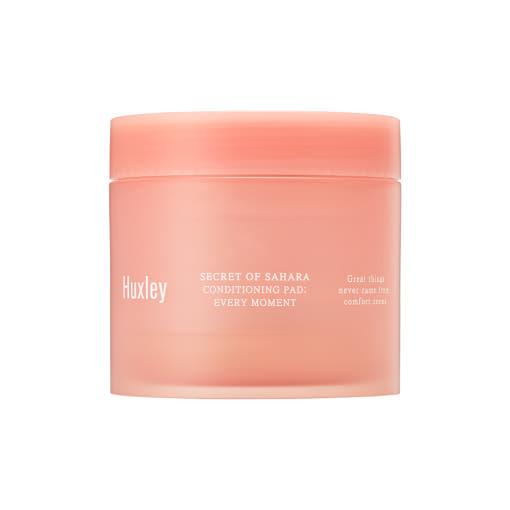 ProtoClinical k-beauty soft coral beauty graphic with pale aqua side accents on a light background.