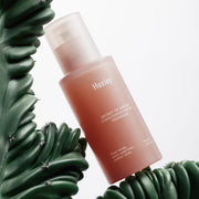 ProtoClinical k-beauty Huxley Conditioning Serum Freeshape 50ml with soft beige, charcoal, and blush packaging forms on a pale background