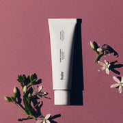 ProtoClinical k-beauty product packaging on a light background.