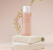 ProtoClinical k-beauty cosmetic graphic in soft pink and cream tones on a light background.