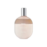 ProtoClinical k-beauty warm beige beauty graphic with a lighter vertical center on a peach background.