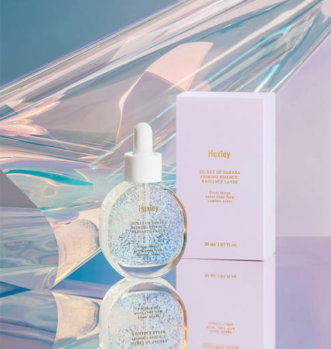 ProtoClinical k-beauty soft blue and lavender beauty gradient on a light background.