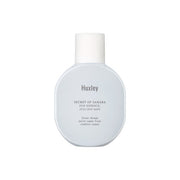 ProtoClinical k-beauty blue-gray beauty bottle on a white background with pale blue side accents.