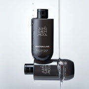 ProtoClinical k-beauty dark beauty product with soft blue-gray side panels on a white background.