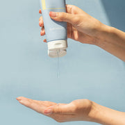 ProtoClinical k-beauty NEOGEN Azulene Soothing PH Cleanser 150ml pale blue cleanser tube standing upright on a light background with a warm beige cap