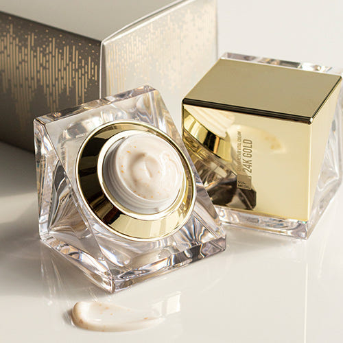 ProtoClinical k-beauty gold beauty product detail on a soft peach background.