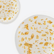 ProtoClinical k-beauty pale beige beauty product detail on a light background.