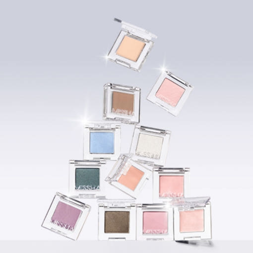 ProtoClinical k-beauty MISSHA Modern Shadow 1.7g-2g (34color) single upright eyeshadow package in soft beige-gray tones centered on a pale lavender and white background