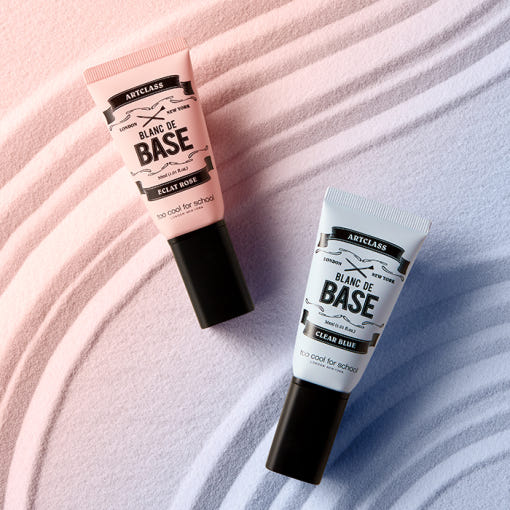 ProtoClinical k-beauty [TOO COOL FOR SCHOOL] Artclass Blanc De Base 30ml (2 Colors) two upright primer packages side by side on a white background with soft pink and blue accents