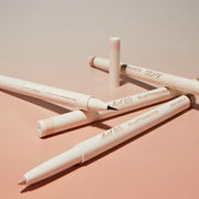 ProtoClinical k-beauty [TOO COOL FOR SCHOOL] Artclass Glam Under Liner 0.2g/0.7g (4 Colors) five cream liner pens layered diagonally on a peach background with one beige pencil tip and one fine brush tip exposed