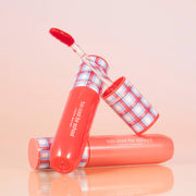 ProtoClinical k-beauty [TOO COOL FOR SCHOOL] Glossy Blaster Tint 3.4g (9colors) coral pink lip tint silhouette centered on a peach and pale mint background