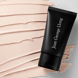 ProtoClinical k-beauty [TOO COOL FOR SCHOOL] Jean George Llong Sun Block 50ml SPF 50+ PA+++ angled black sunscreen tube over beige cream streaks on a light background