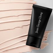ProtoClinical k-beauty [TOO COOL FOR SCHOOL] Jean George Llong Sun Block 50ml SPF 50+ PA+++ angled black sunscreen tube over beige cream streaks on a light background