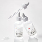 ProtoClinical k-beauty [MANYO FACTORY]  Galactomy Niacin Essence 50ml blue and taupe silhouette on a light background.