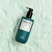 ProtoClinical k-beauty green beauty product detail with a darker center on a pale mint background.