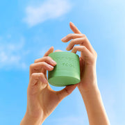ProtoClinical k-beauty blue and taupe beauty product silhouette on a light background.